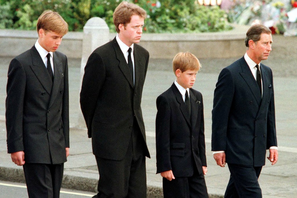 Princes William and Harry, Earl Spencer, and then-Prince Charles walking during Princess Diana's funeral service.