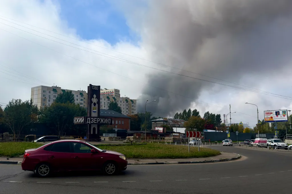 Thick smoke rises from the Gazprom Neft Moscow oil refinery.