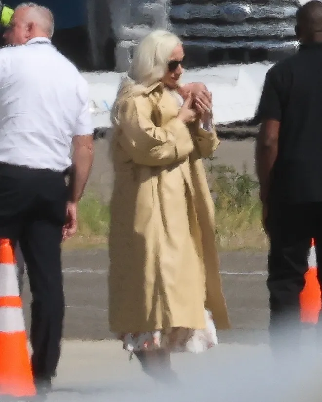 Lady Gaga arriving in Los Angeles with her newborn baby.
