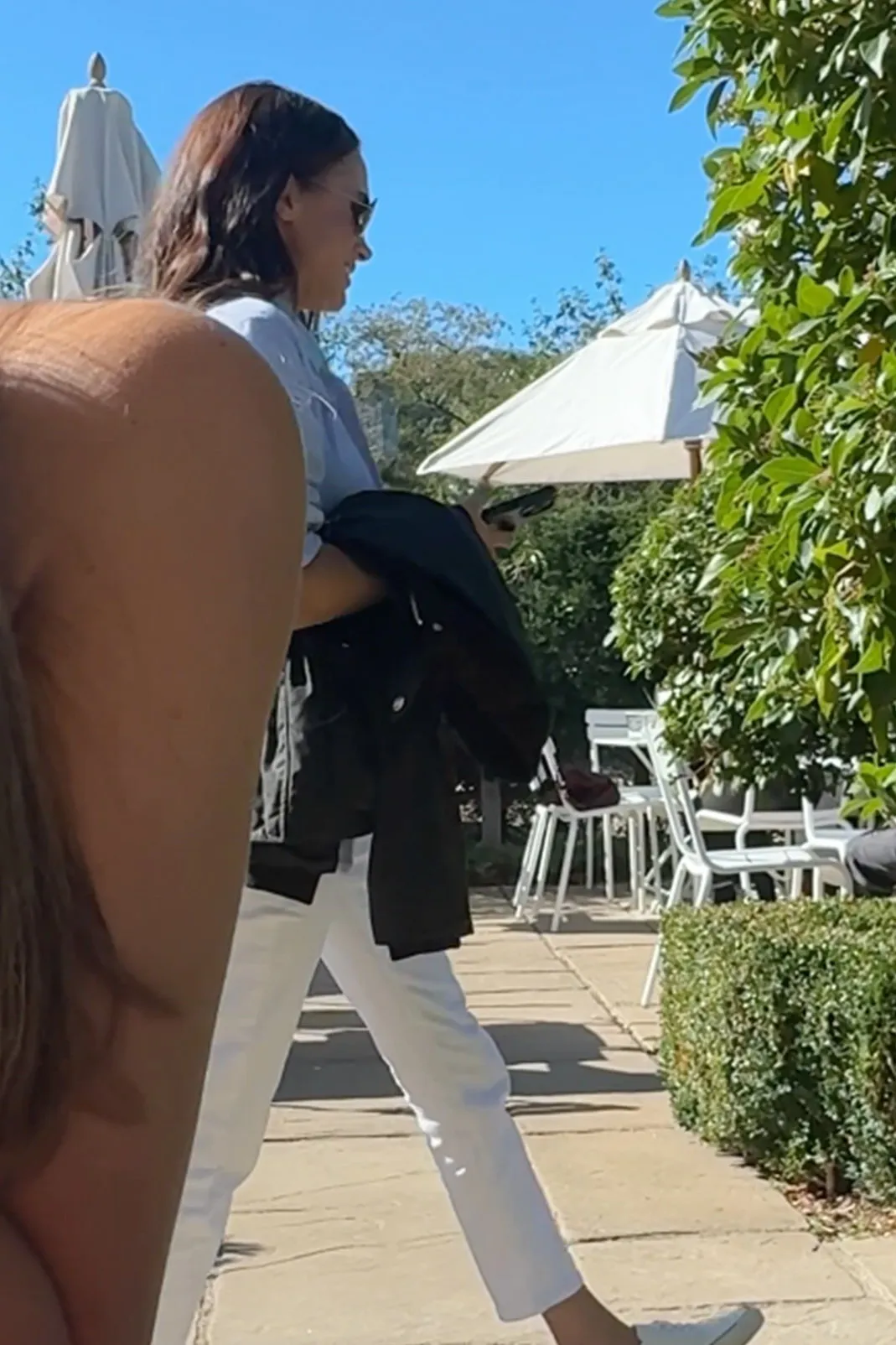 Meghan Markle outside The Three Horseshoes pub in the Cotswolds.