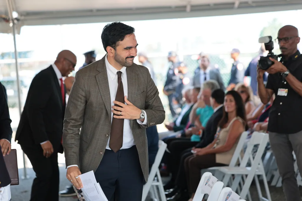 New York Mayor Zohran Mamdani and NYC Department of Correction Commissioner Stanley Richards arrive for a 9/11 tribute ceremony.