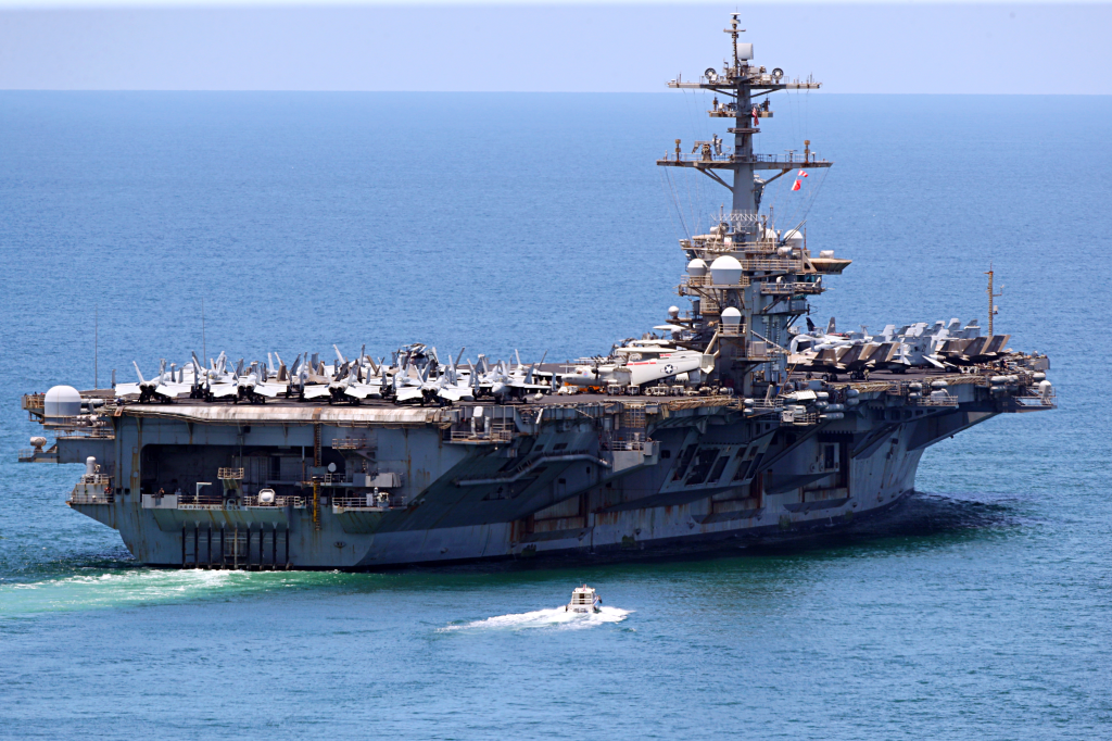 The USS Abraham Lincoln aircraft carrier departs Laem Chabang Port in Thailand.