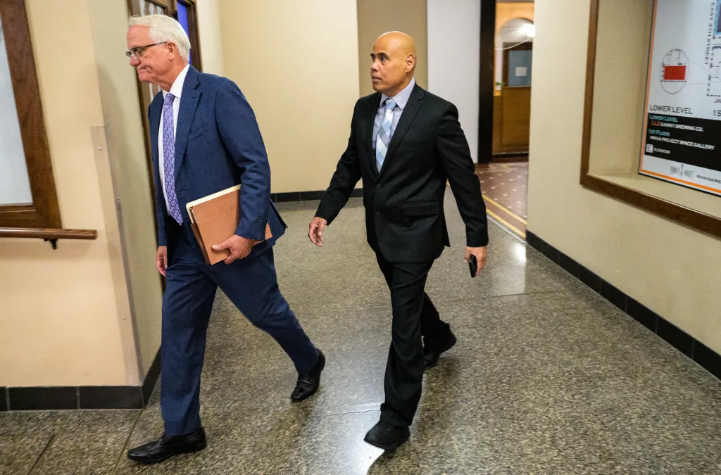 ICE Officer Christian Castro departs the Warren E. Burger Federal Building and U.S. Courthouse.