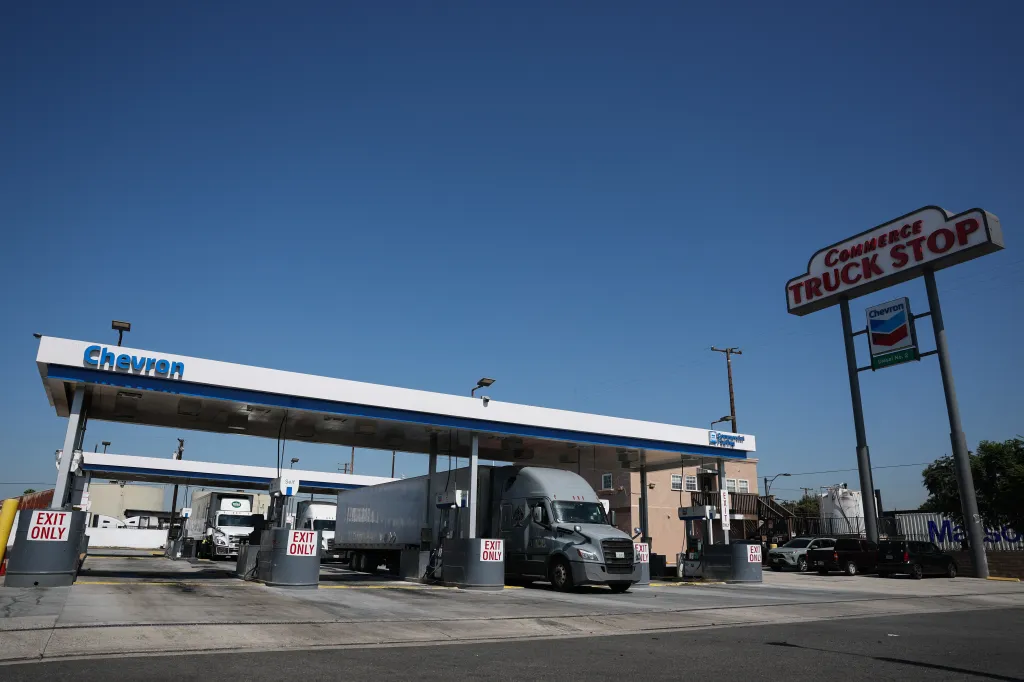 A truck refueling at a Chevron commercial fueling station.