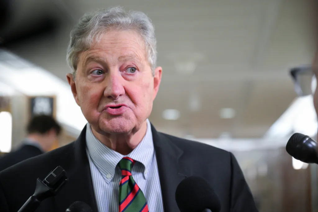 U.S. Senator John Kennedy speaking with journalists.