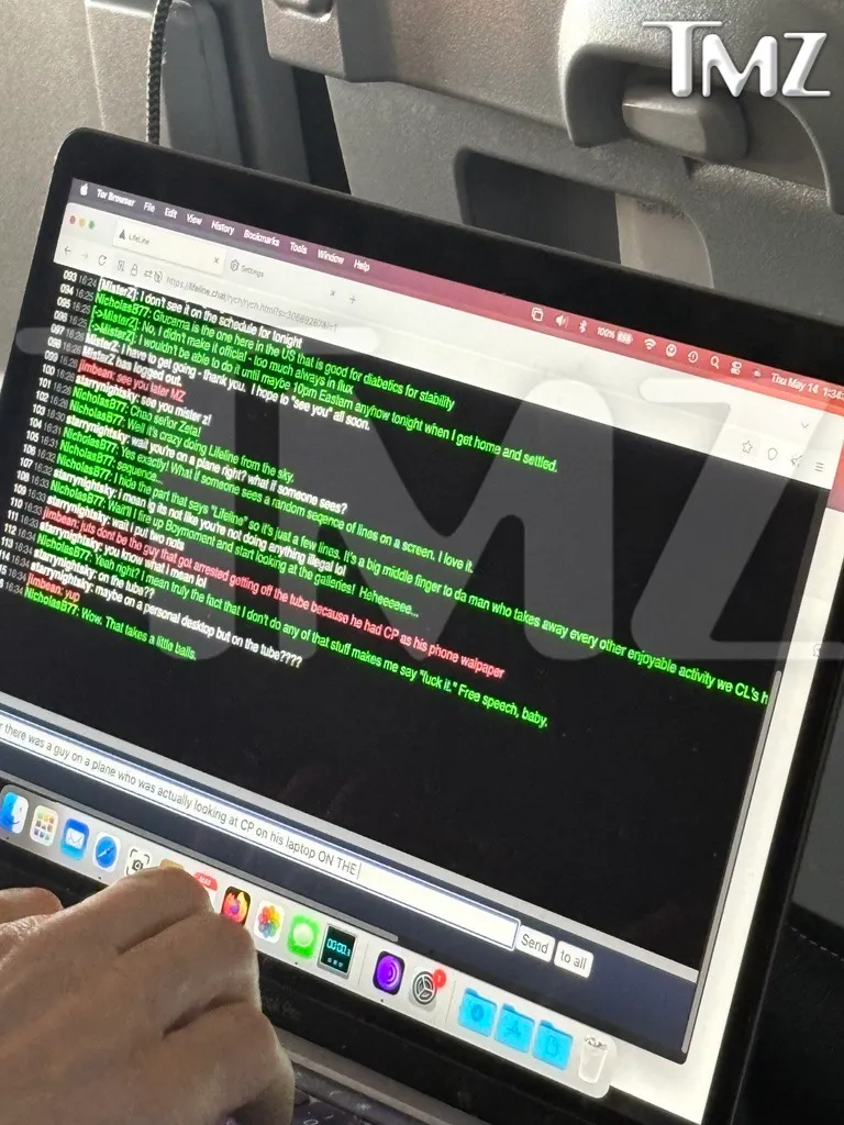 A person's hands on a laptop keyboard, displaying a chat window with various conversations.