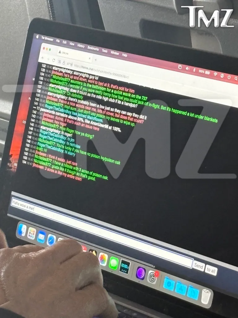 A close-up of a person's hands typing on a laptop, displaying an explicit chat log on the screen.