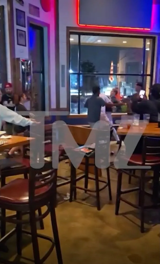 Brian Hickerson involved in an altercation with people inside a restaurant.