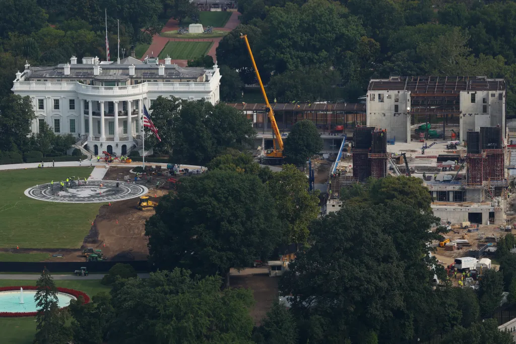 Aerial view of the White House with a large ballroom under construction to the right.