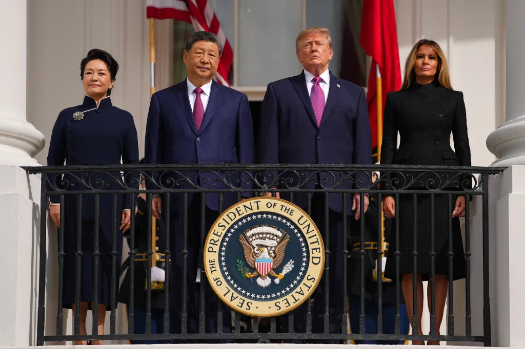 First lady of China Peng Liyuan, President of China Xi Jinping, U.S. President Donald Trump and first lady Melania Trump stand together at the White House.