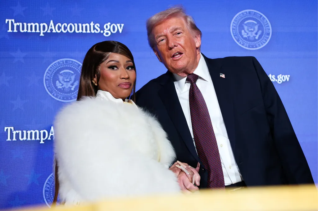 Musician Nicki Minaj and Donald Trump on stage at the Trump Accounts Summit.