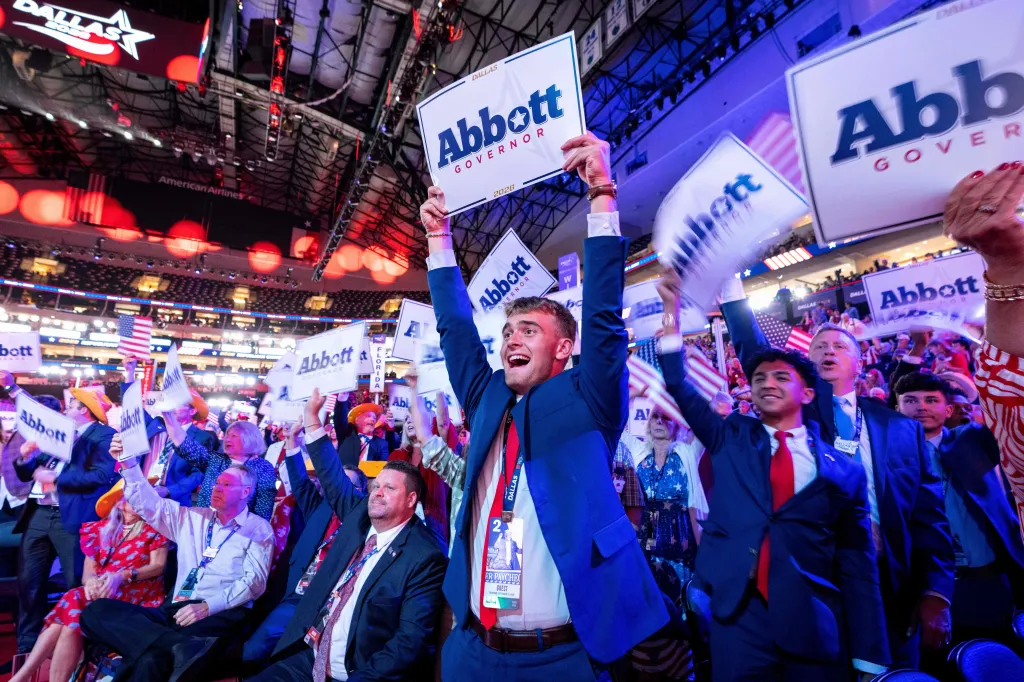 Attendees holding 