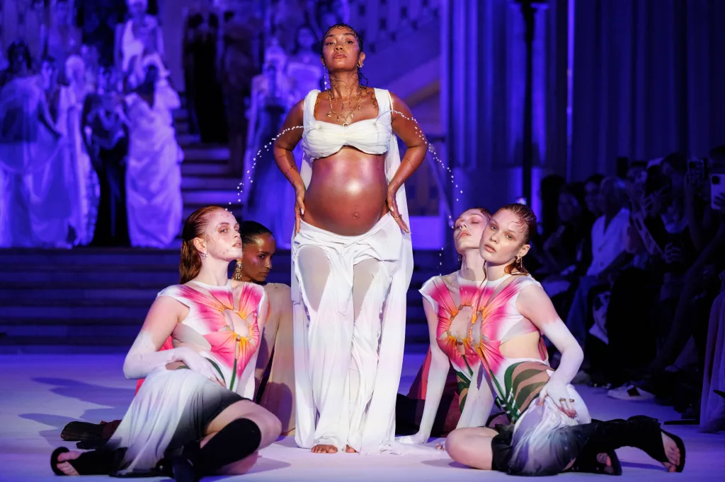 English singer and actress Leigh-Anne Pinnock, center, and models present Spring/Summer 2027 creations by Greek designer Dimitra Petsa during London Fashion Week in London, Monday, Sept. 21, 2026. London Fashion Week takes place from Sept. 17 to Sept. 21, 2026.