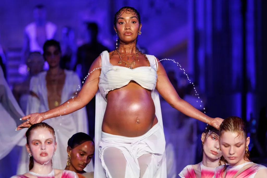 English singer and actress Leigh-Anne Pinnock, center, and models present Spring/Summer 2027 creations by Greek designer Dimitra Petsa during London Fashion Week in London, Monday, September 21, 2026. London Fashion Week takes place from September 17 to September 21, 2026.