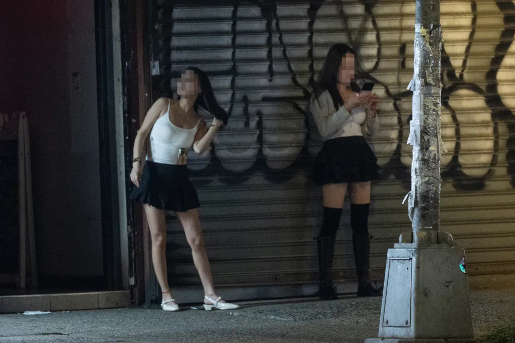 Two sex workers on Roosevelt Avenue in Queens, New York.
