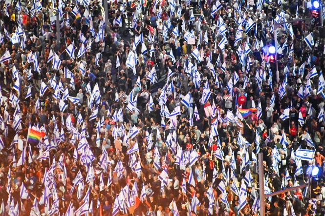 Thousands of protesters attend a demonstration in Tel Aviv