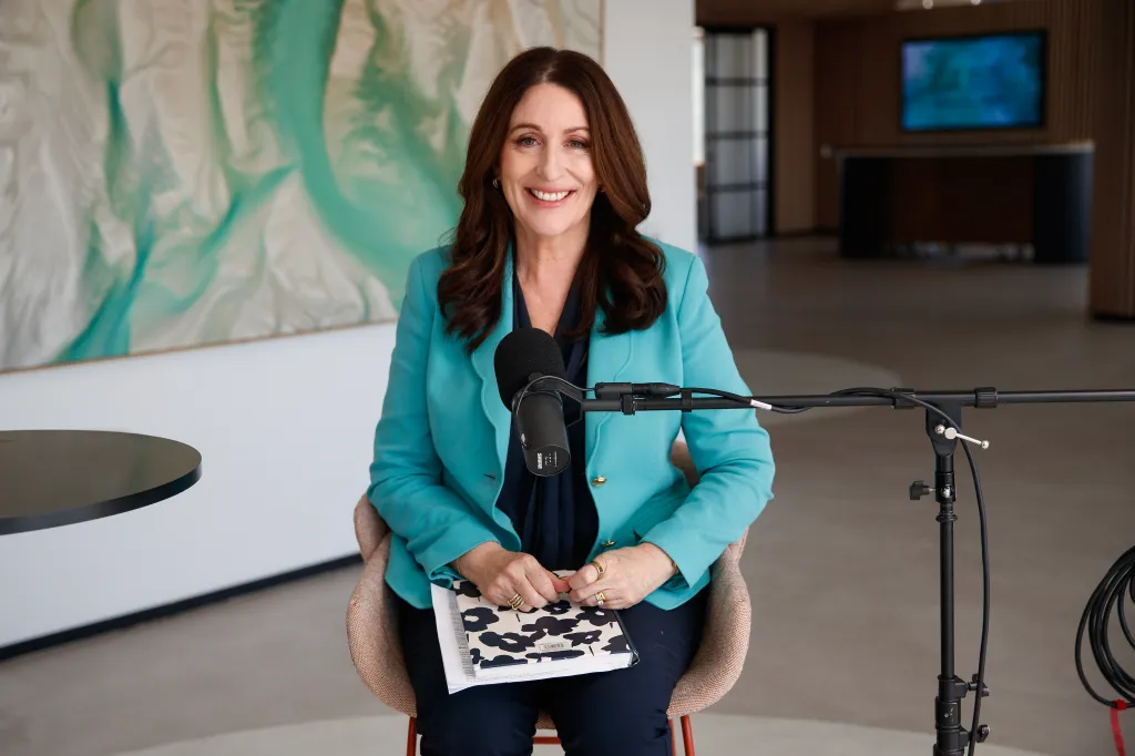Miranda Devine smiles during a Podforce One interview.