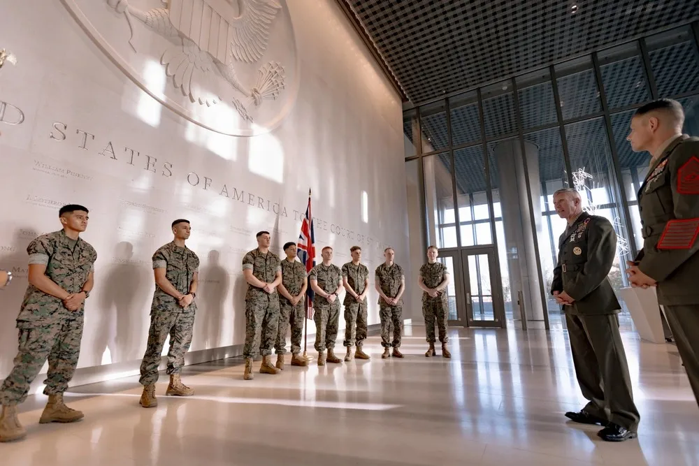 General Eric M. Smith speaks with Marine Security Guard Marines at the U.S. Embassy in London.