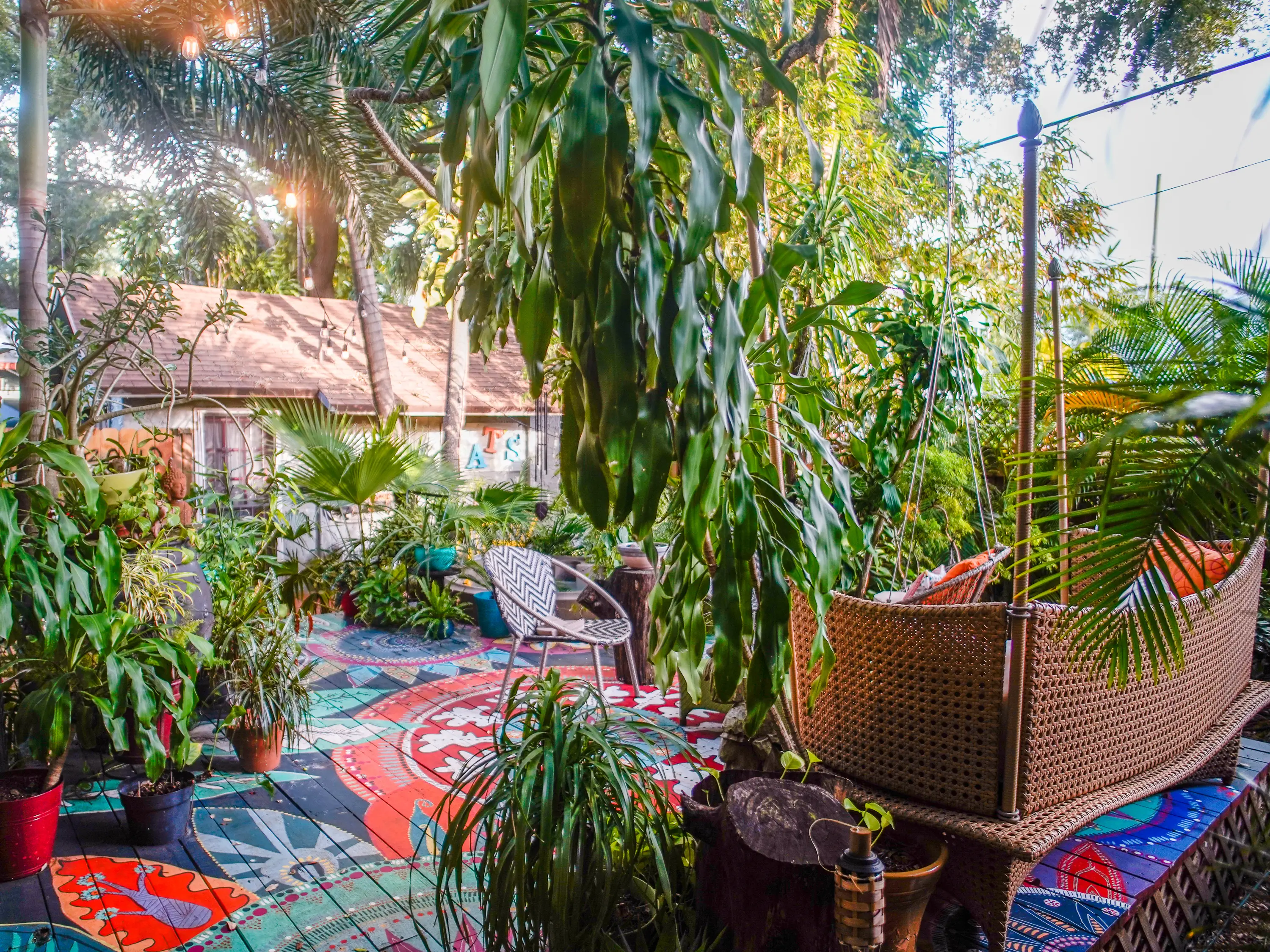 A vibrant patio filled with greenery