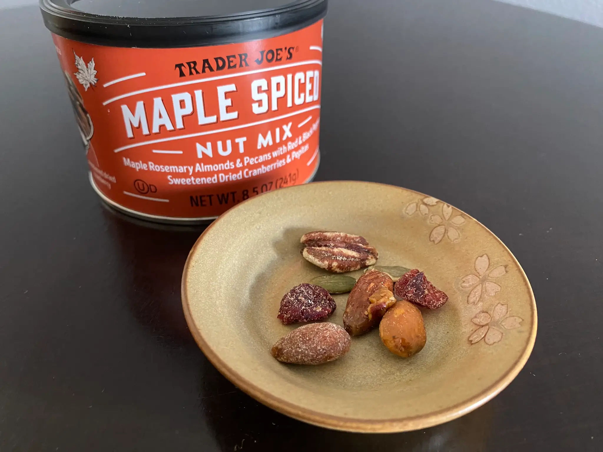 nuts in a small green bowl