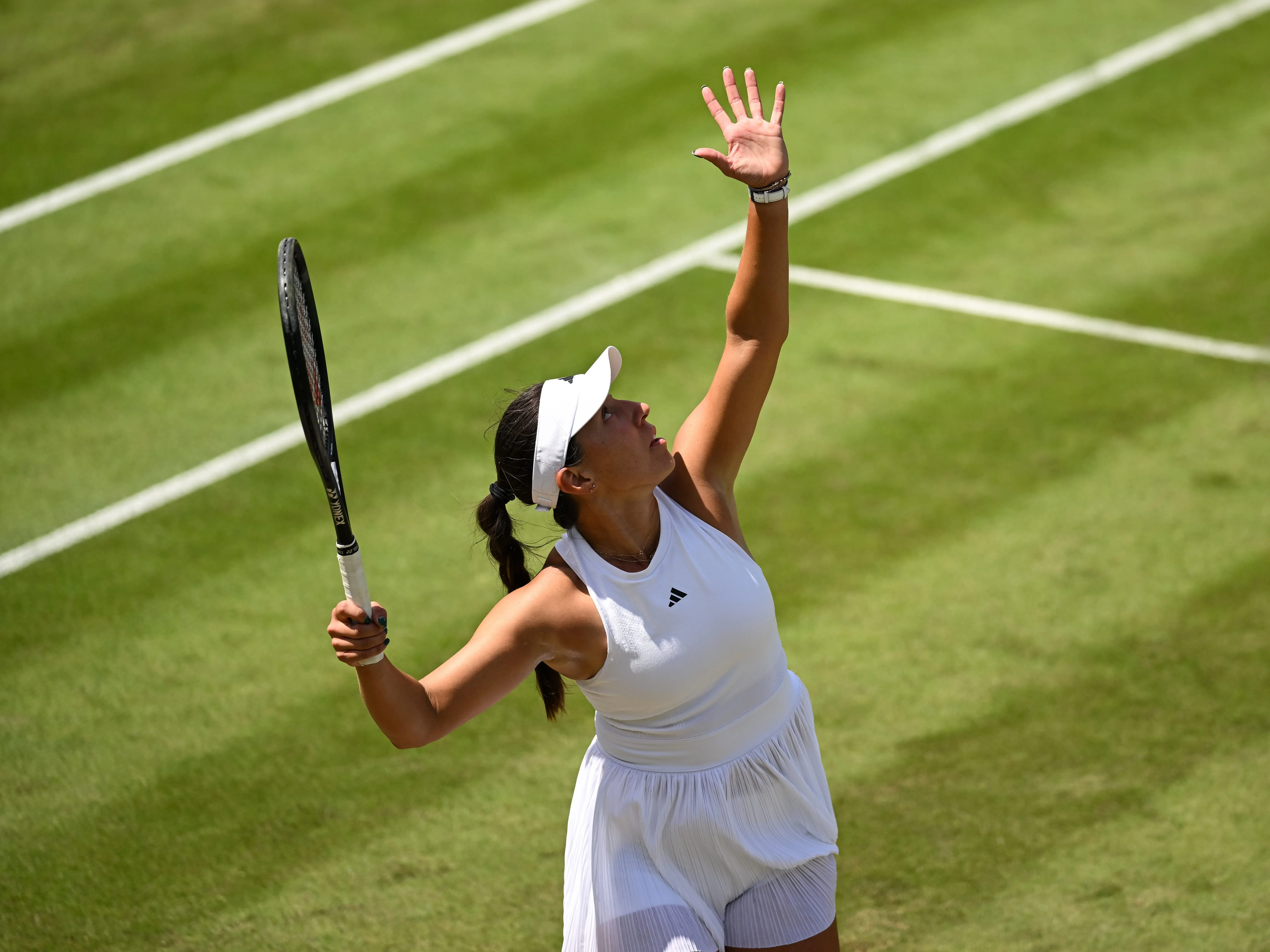 Jessica Pegula in serving position during Wimbledon 2024.