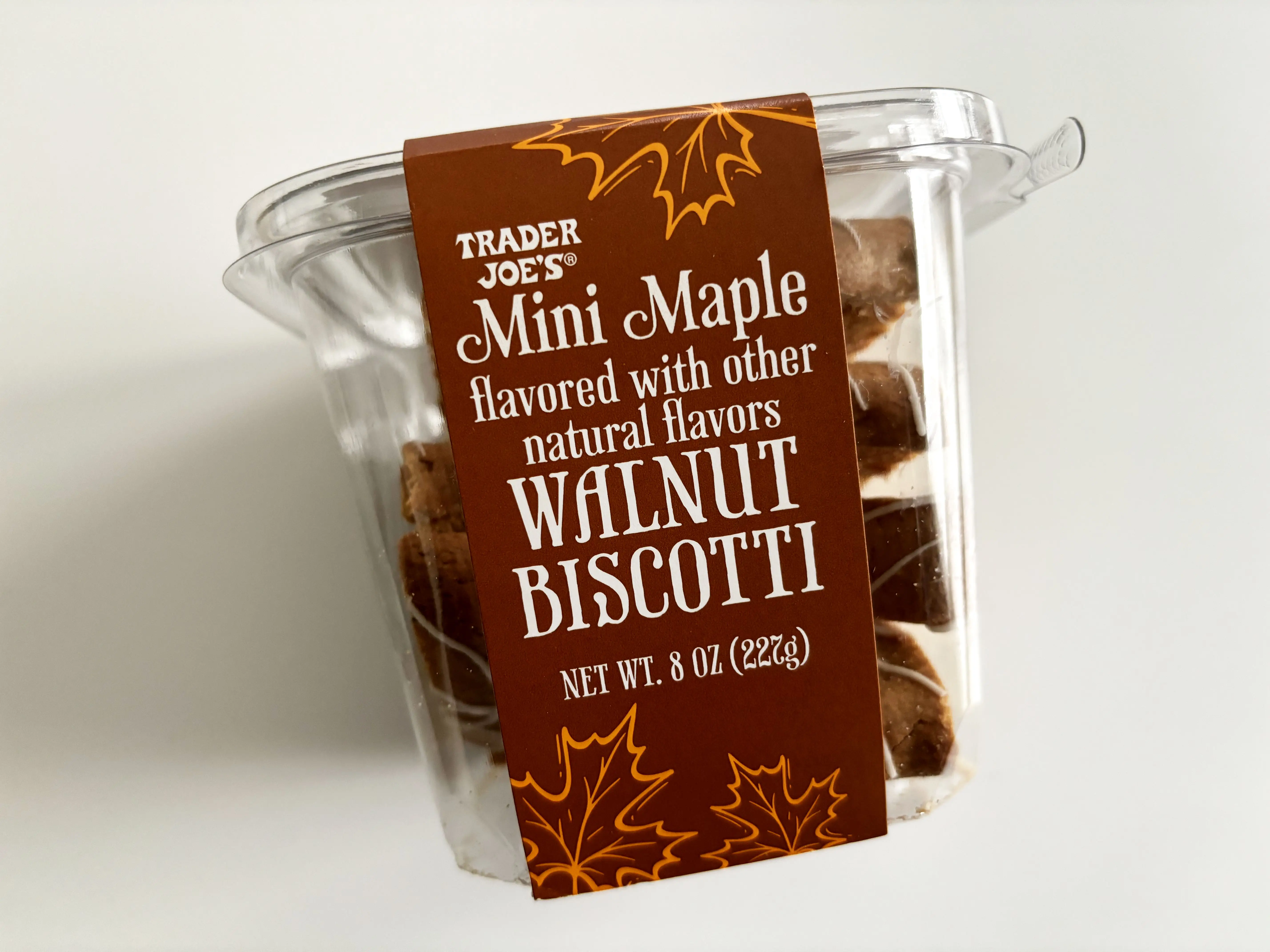 A plastic container of Trader Joe’s mini maple-walnut biscotti.