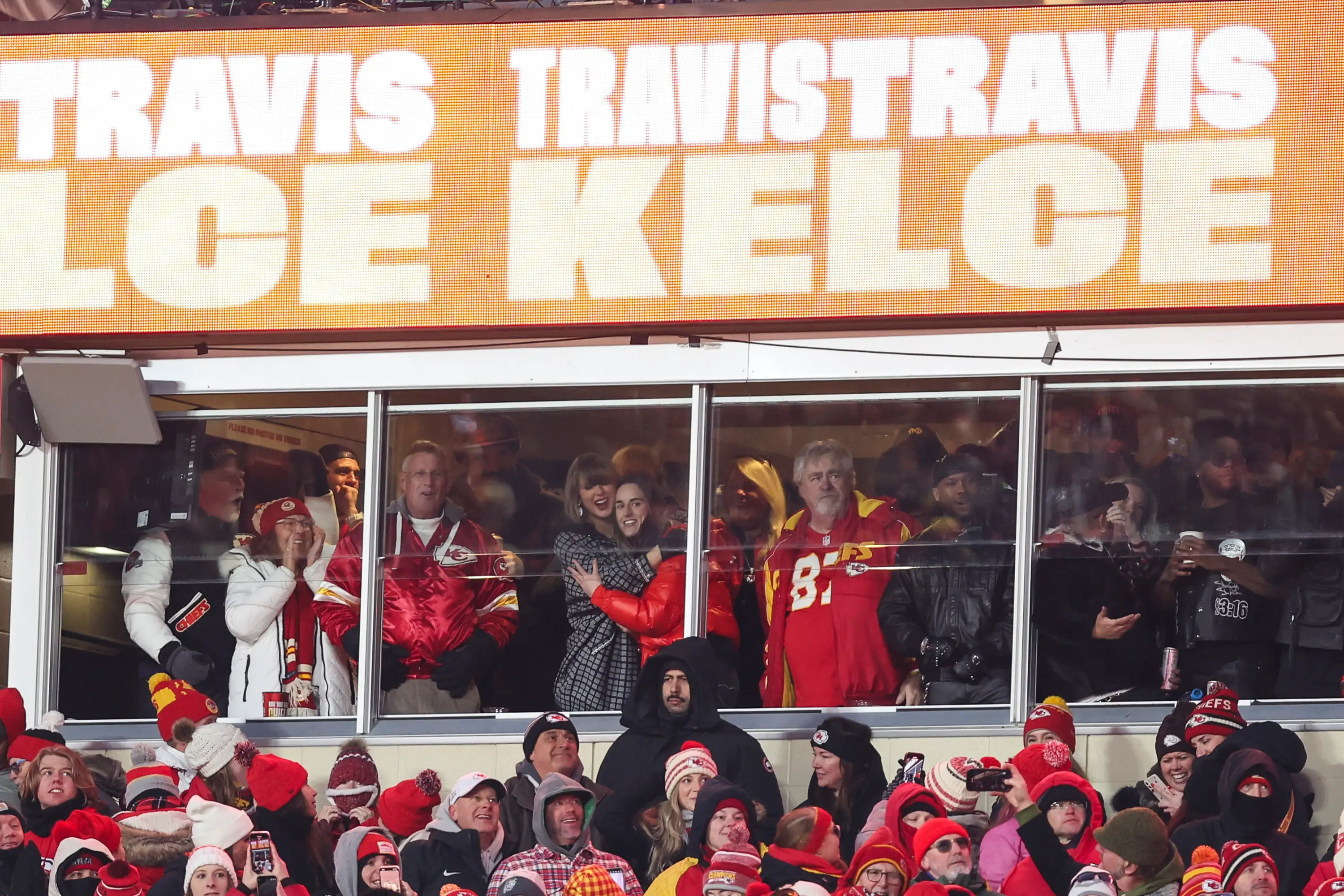 Taylor Swift and Caitlin Clark hug at Arrowhead Stadium on January 18, 2025.