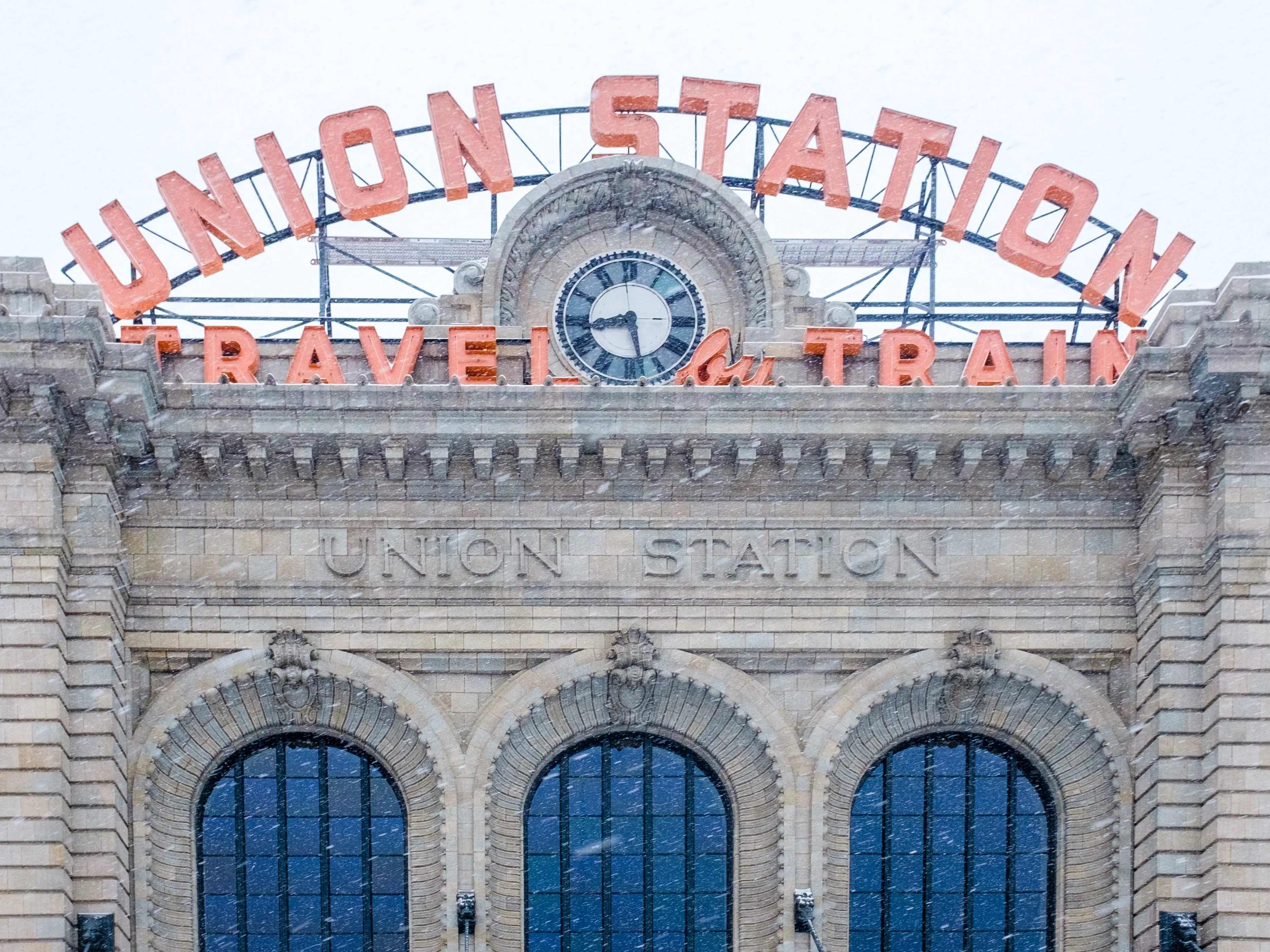 The exterior of Denver's Union Station is seen on a snowy day.