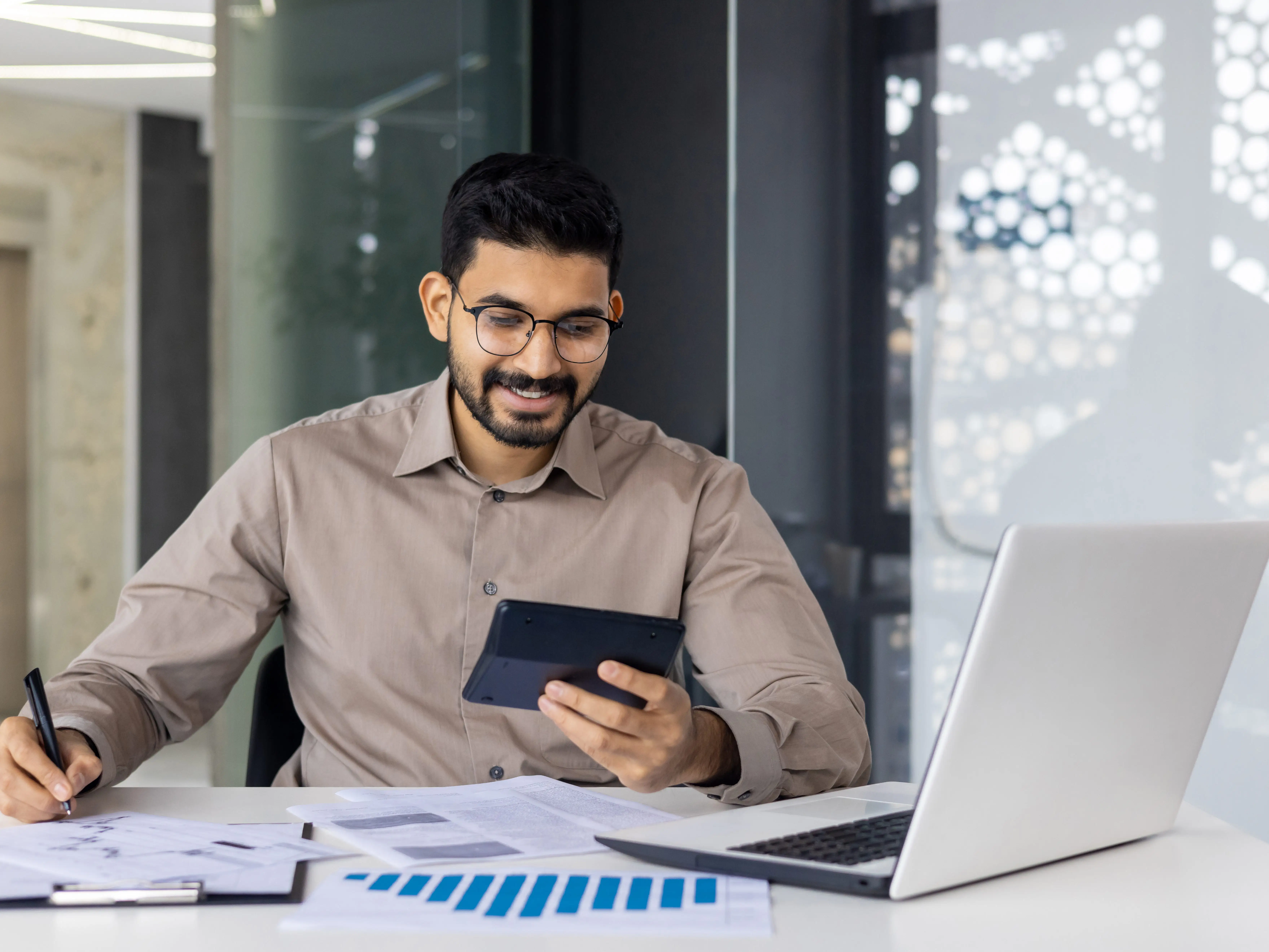 A person using a calculator