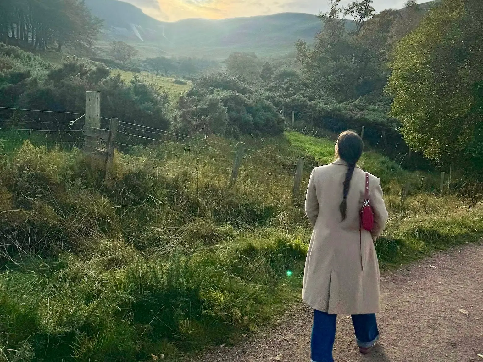 Amanda walking on a path.