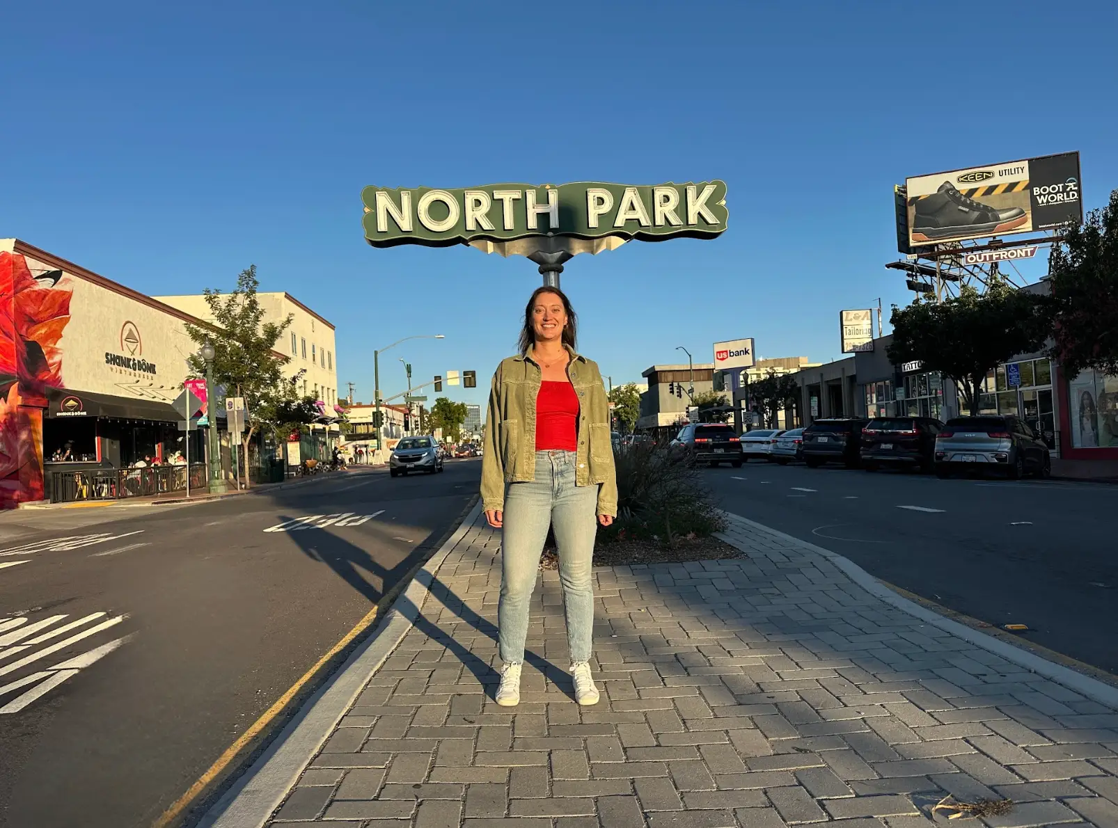 The writer posing in her new neighborhood, North Park, in San Diego.