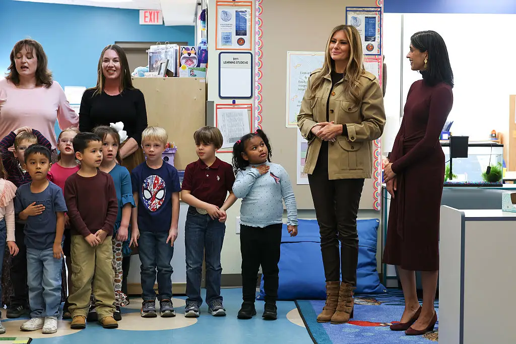 Melania Trump and Usha Vance visit an elementary school.