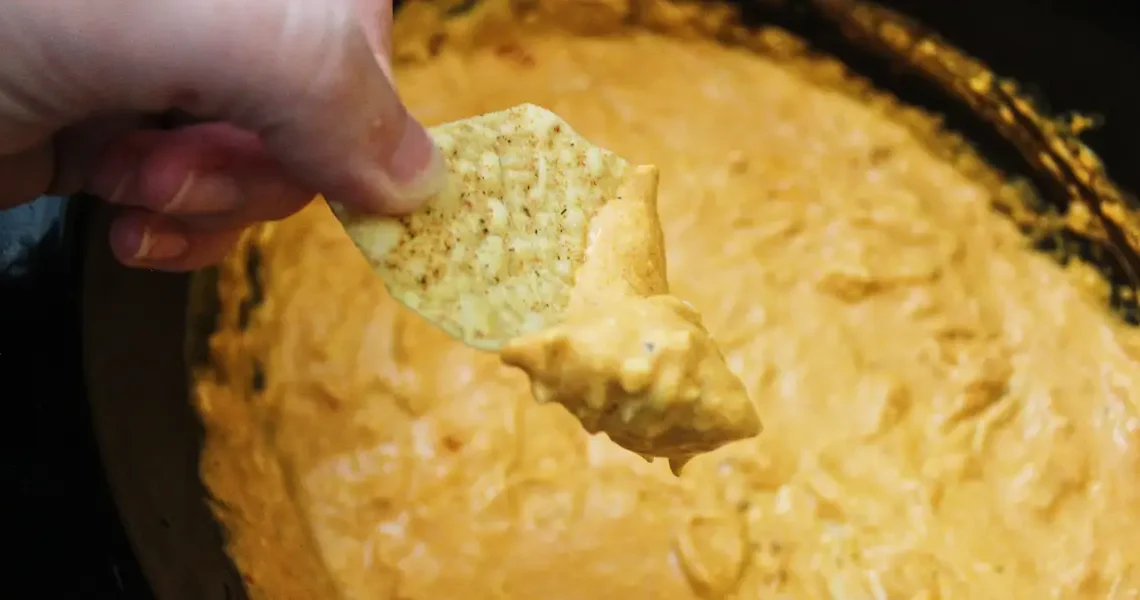 I make this 6-ingredient slow-cooker Buffalo chicken dip every game day. It’s always a crowd-pleaser.