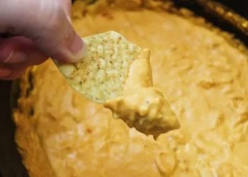 I make this 6-ingredient slow-cooker Buffalo chicken dip every game day. It’s always a crowd-pleaser.