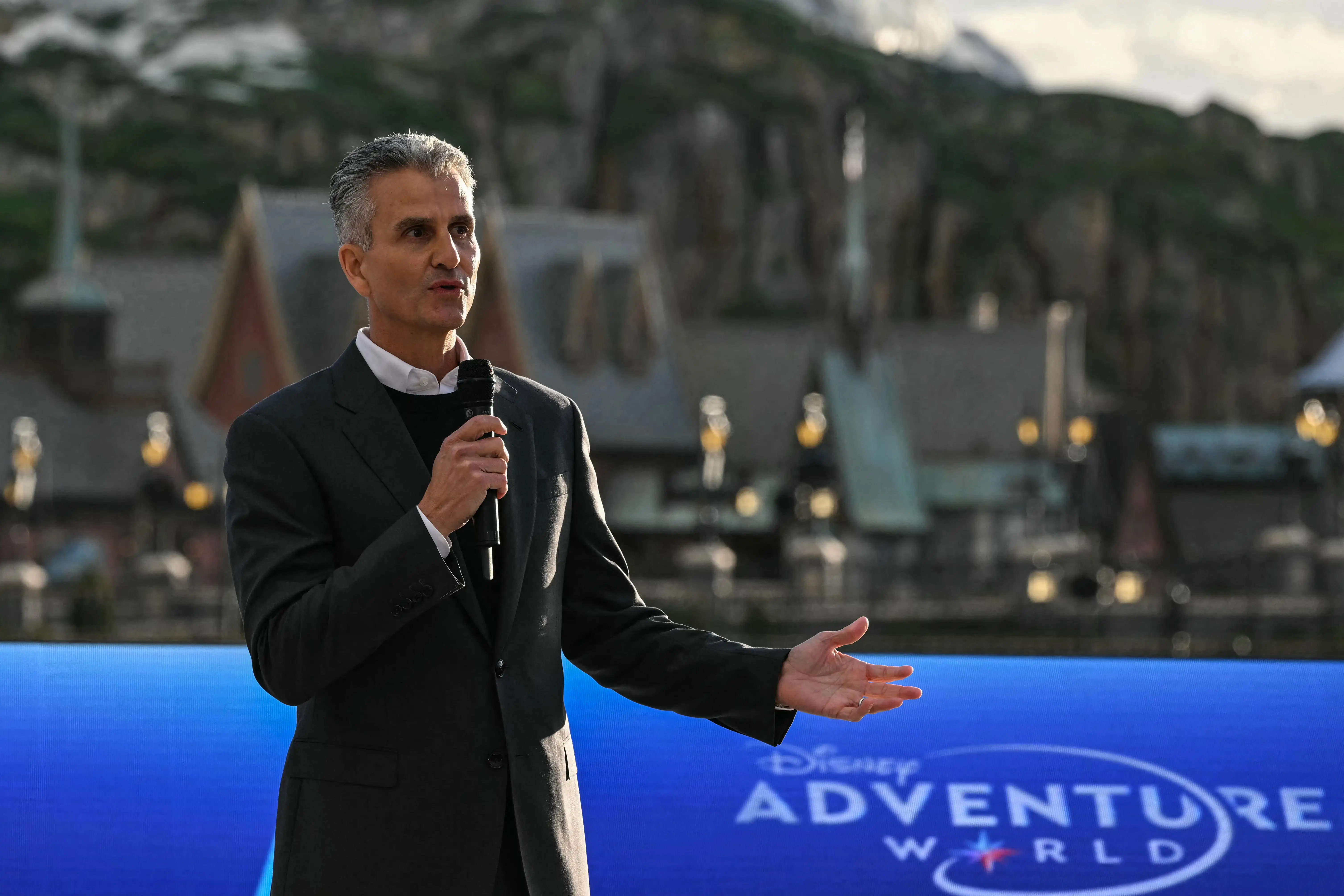 Disney CEO Josh D'Amaro stands at Disney Adventure World