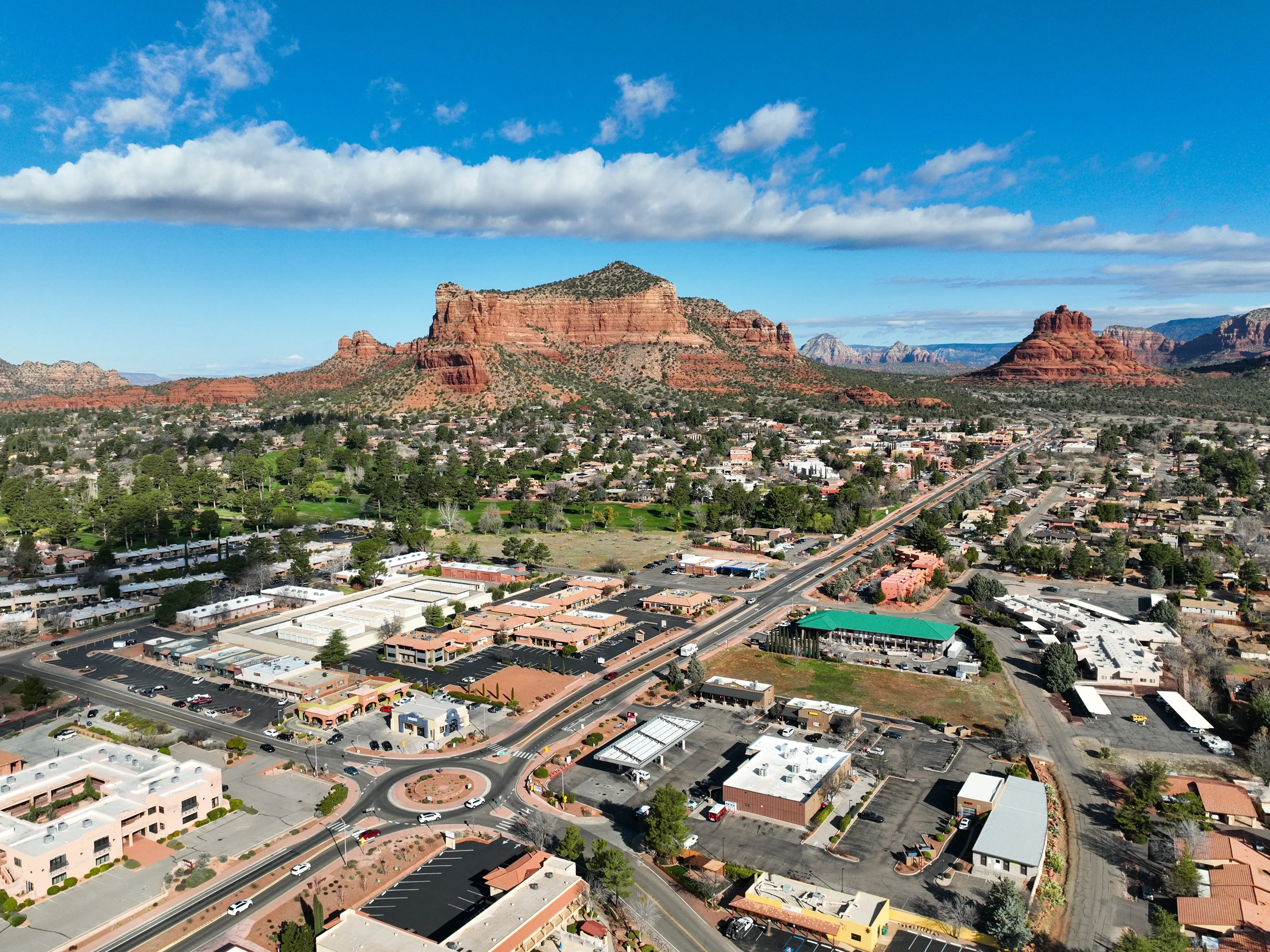 Sedona Arizona Area Landscape on a Partly Cloudy day with parts of the Red Rock Park and a Blue Sky