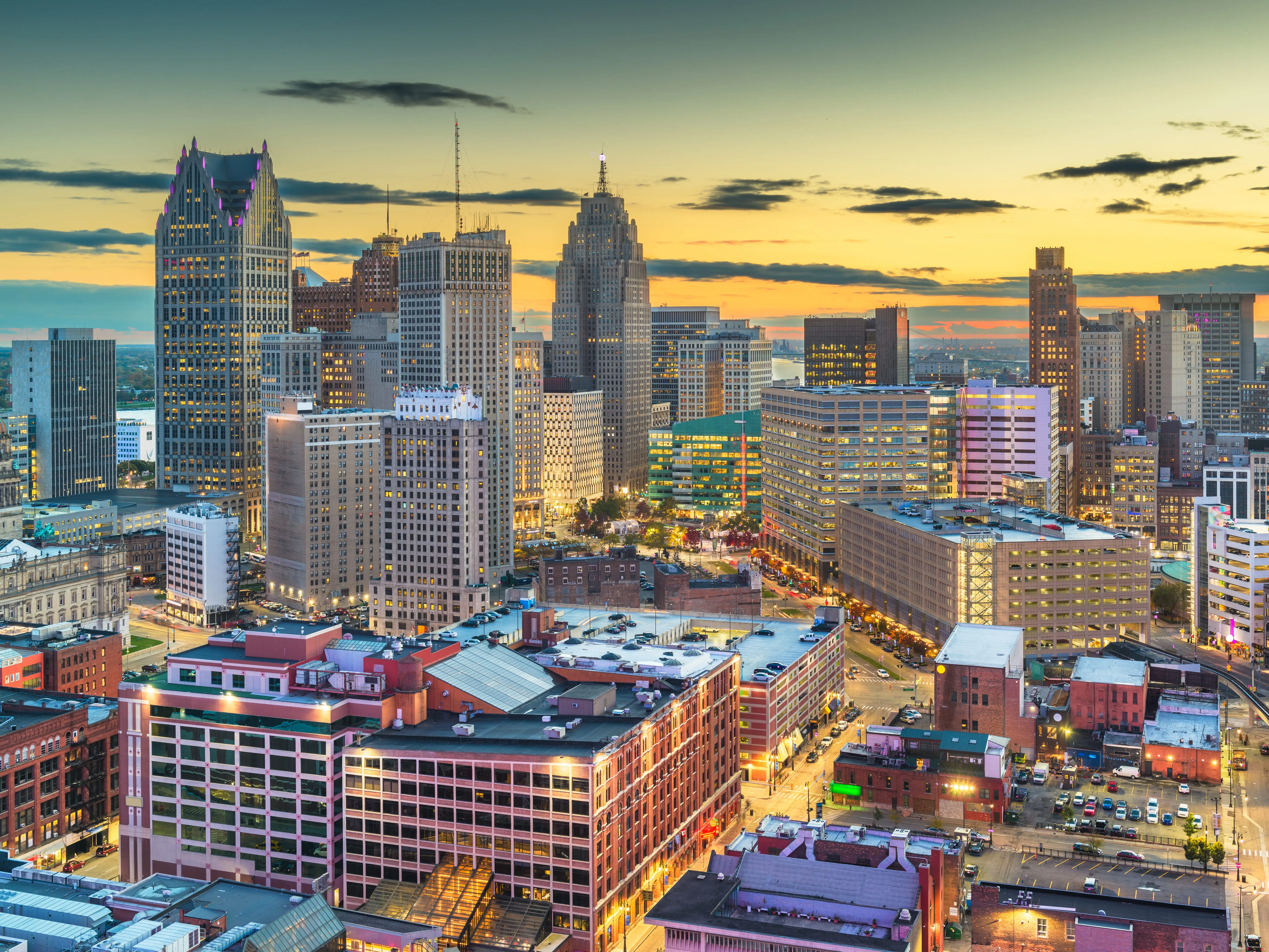 Detroit, Michigan, USA downtown skyline from above at dusk.