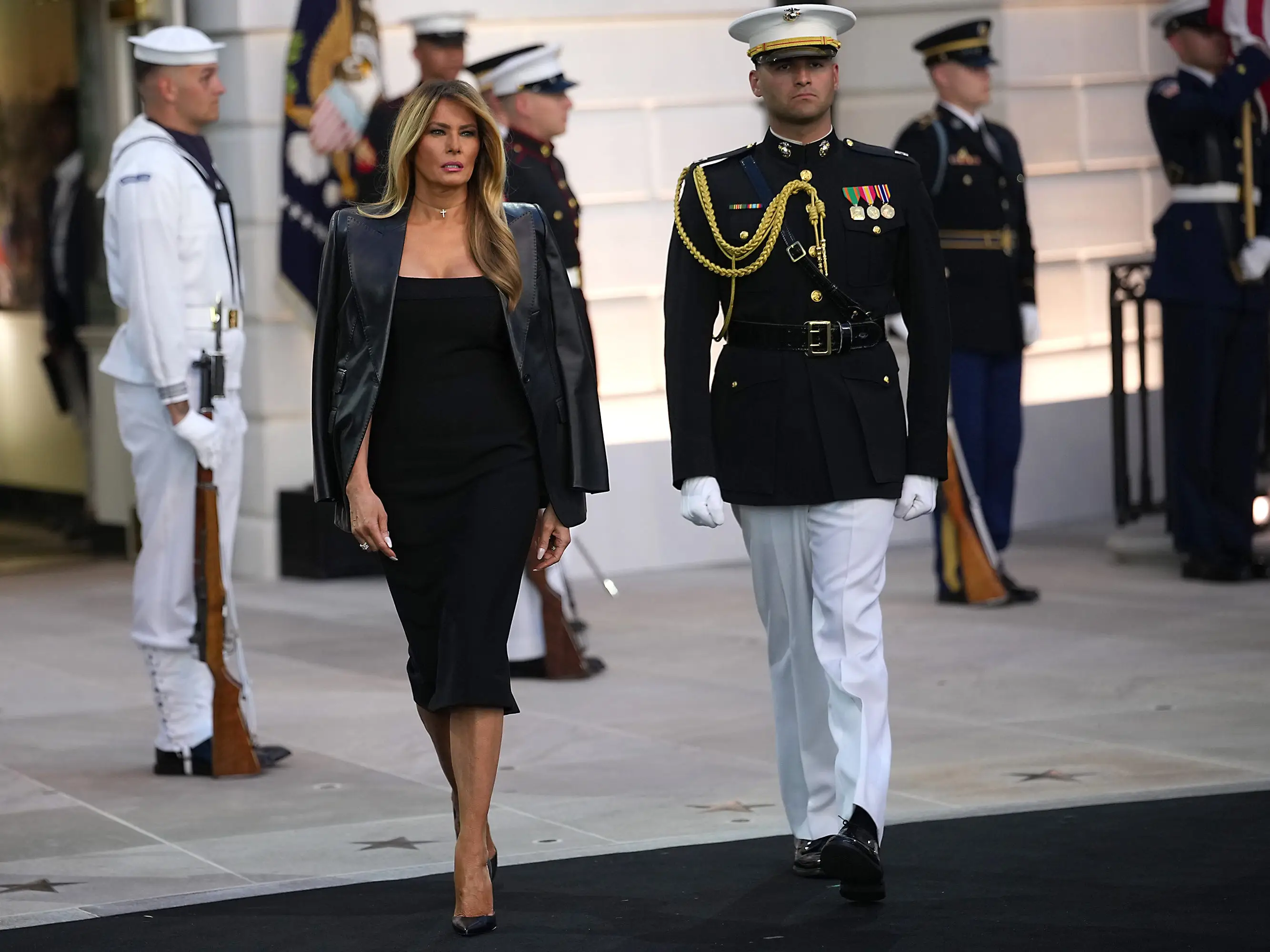 Melania Trump walks out of the White House onto the South Lawn for the UFC Freedom 250 fight in June 2026.