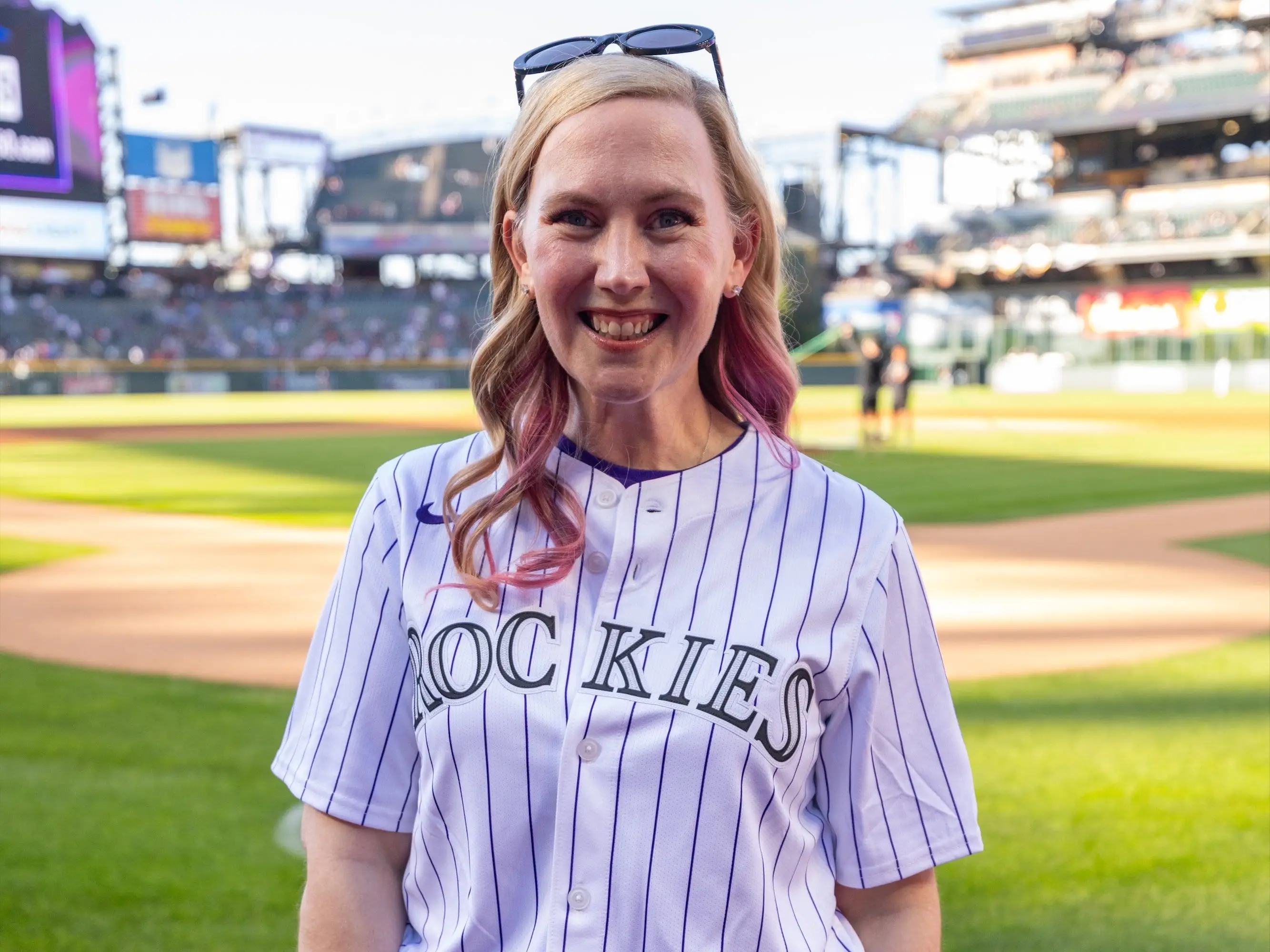 Rebecca Yarros at a Rockies game in May 2026.