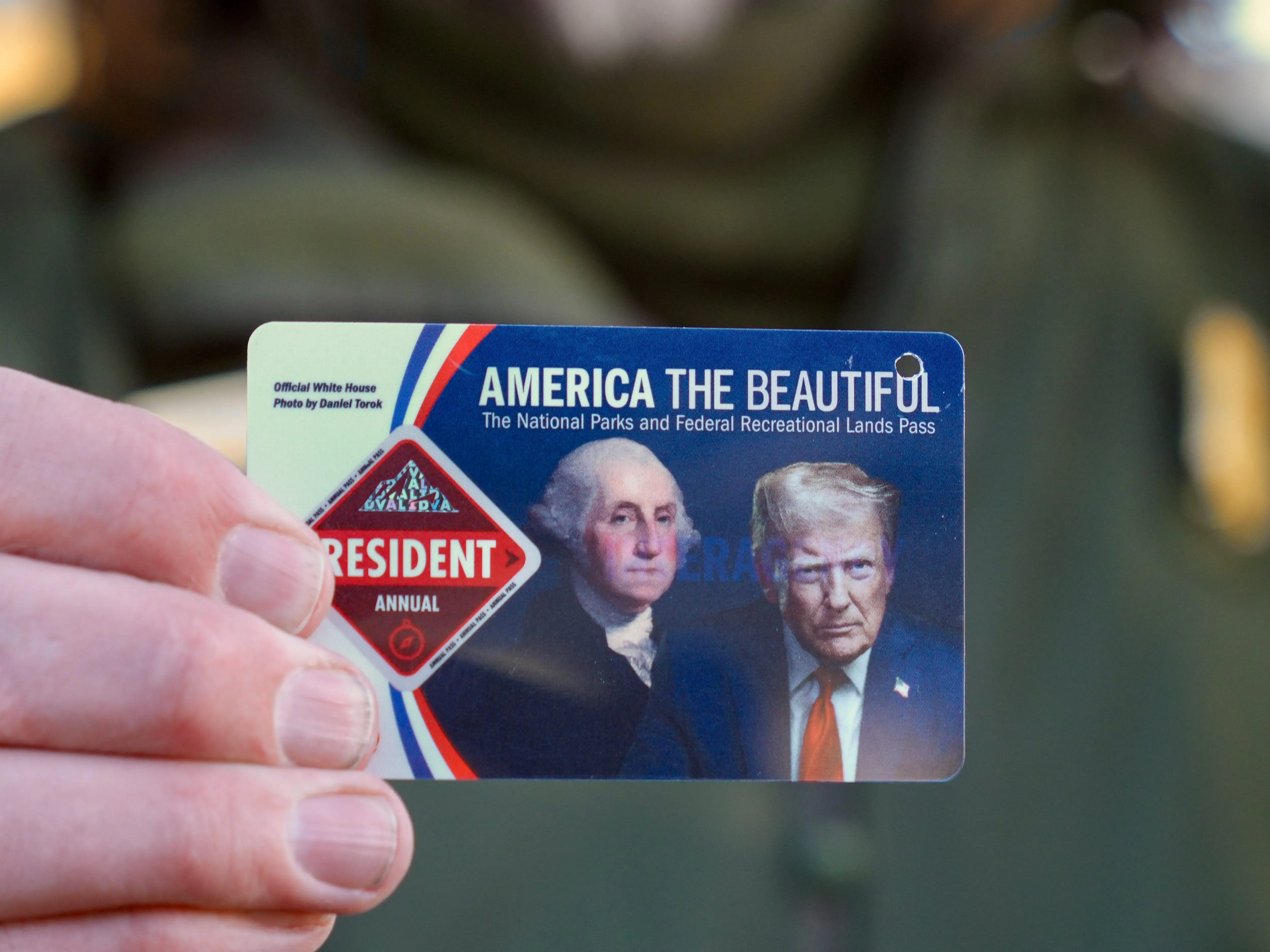 The new America the Beautiful annual pass featuring Donald Trump's face.