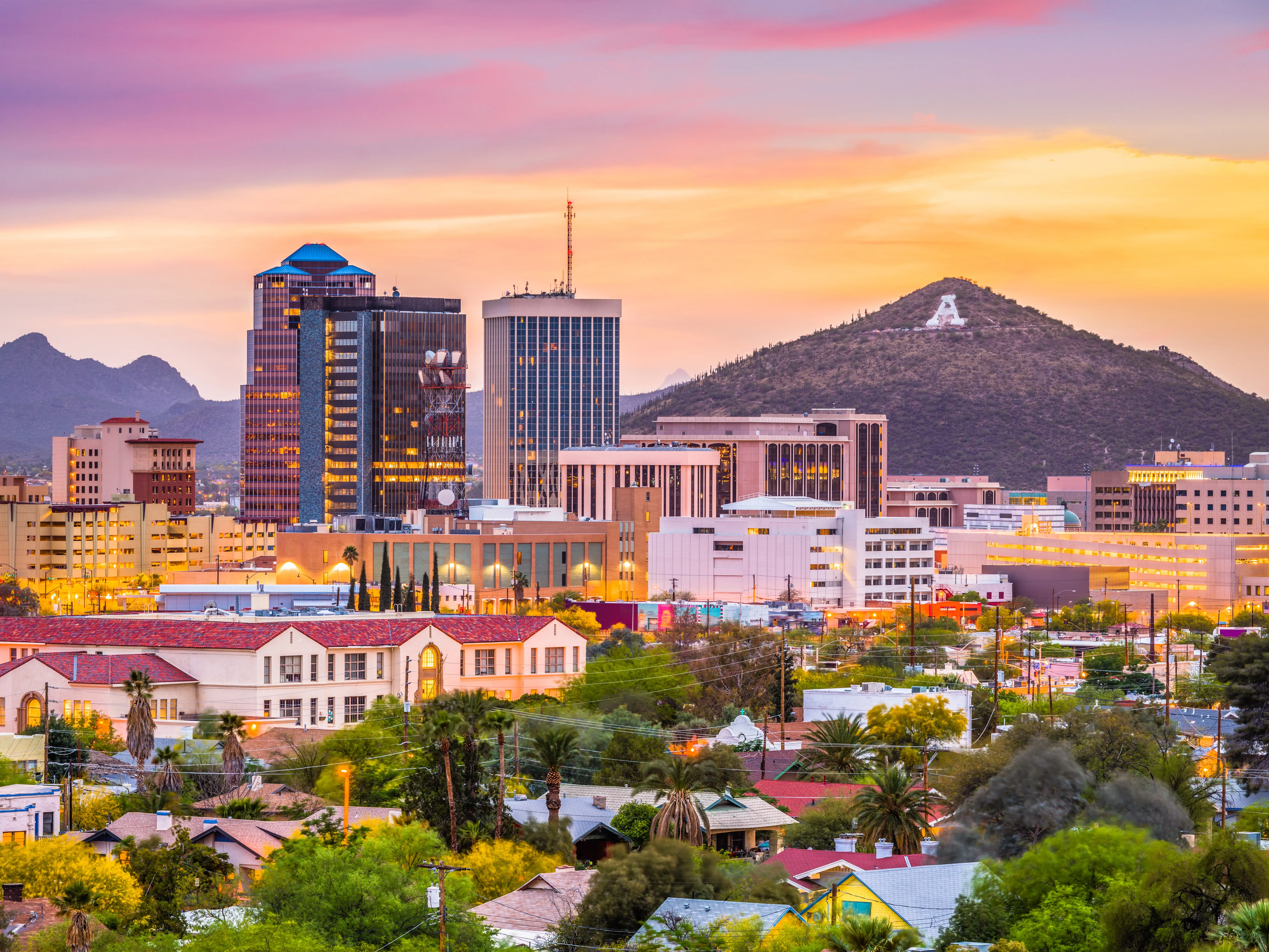 Tucson, Arizona, USA downtown skyline with Sentinel Peak at dusk. (Mountaintop 