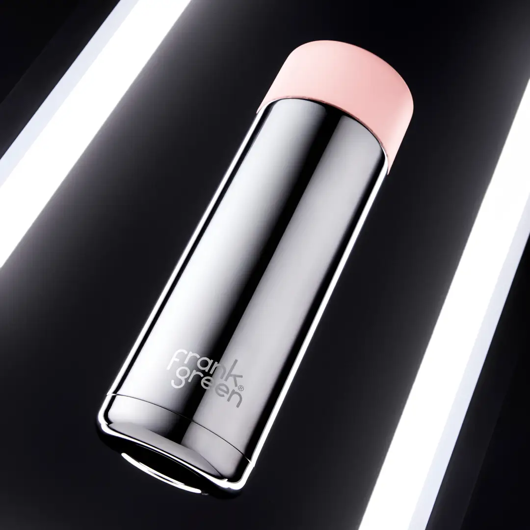 A Frank Green water bottle in chrome.