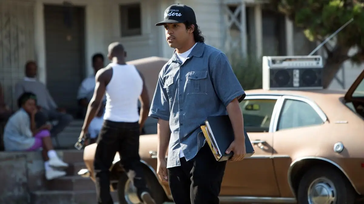 Straight Outta Compton star O'Shea Jackson Jr. walking with a folder under his arm