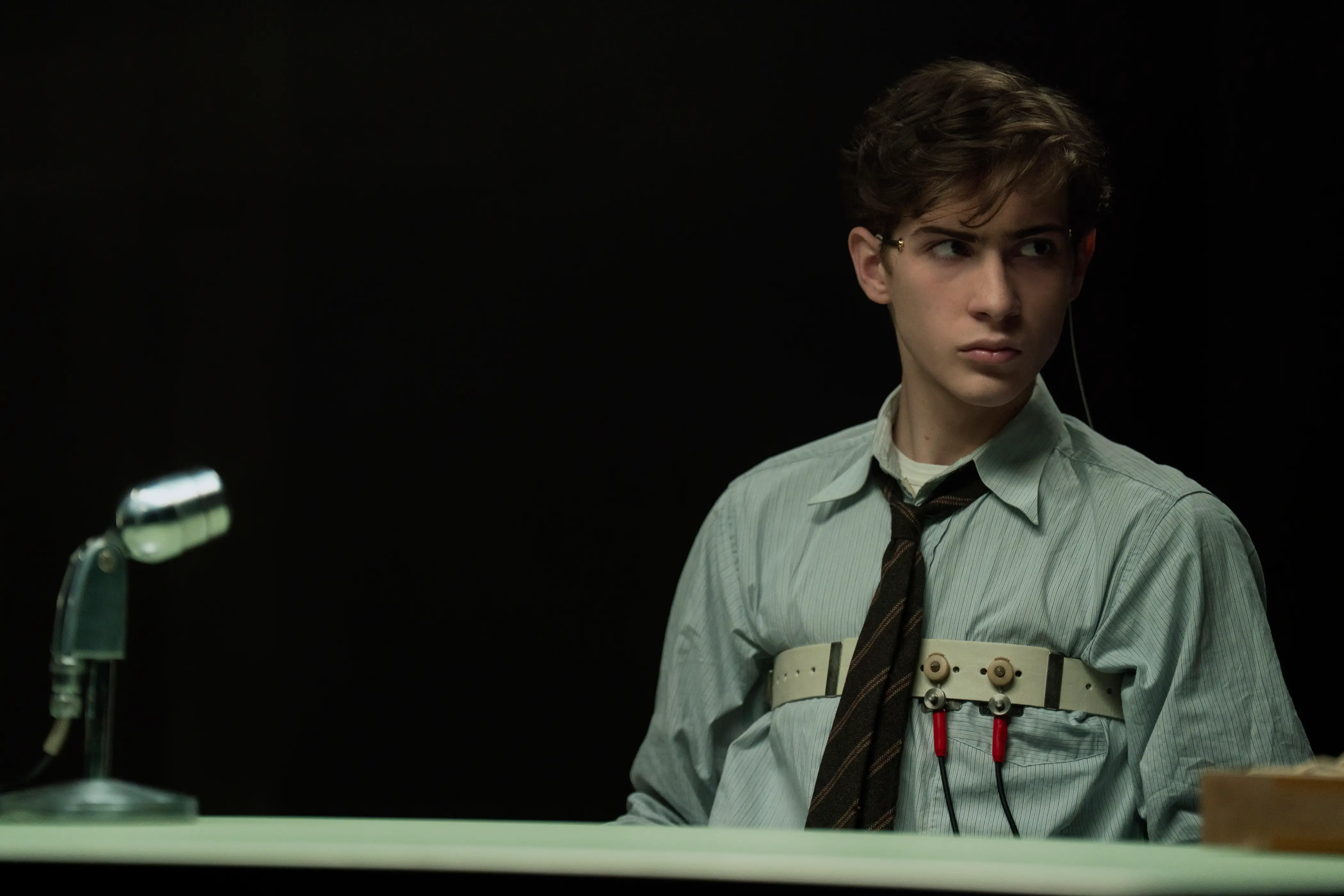Unabomber star Jacob Tremblay in a shirt and tie with sensors on him