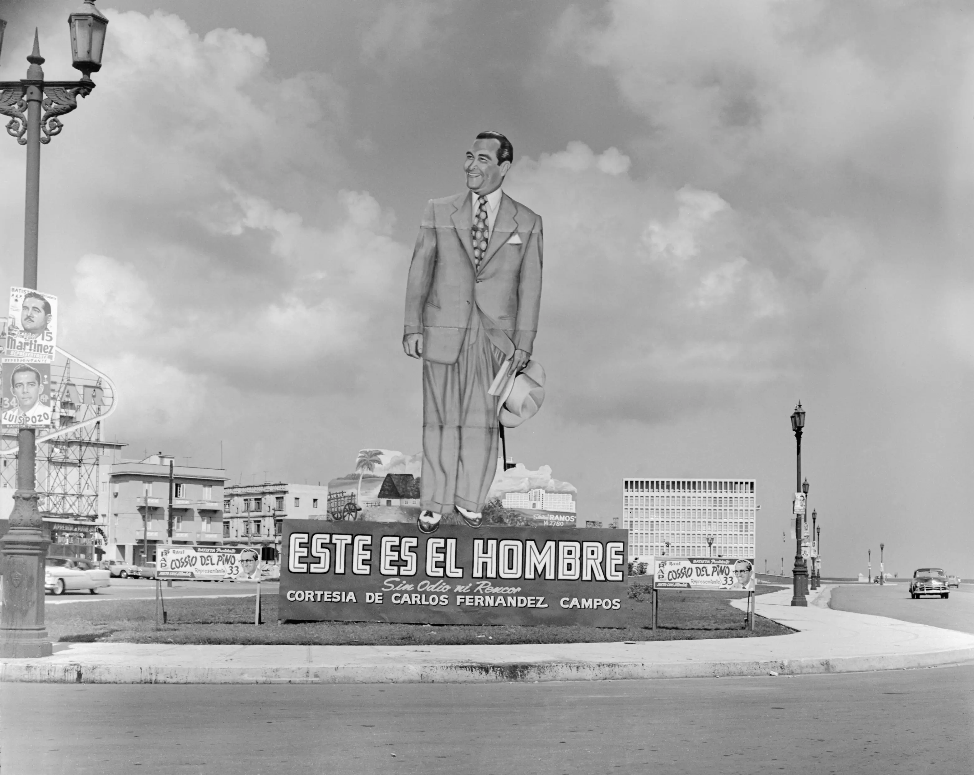 Motorists in Havana were surprised to see a 35 foot figure of Cuba's President Fulgencio Batista smiling down on them from a small park, and below the figure the words 