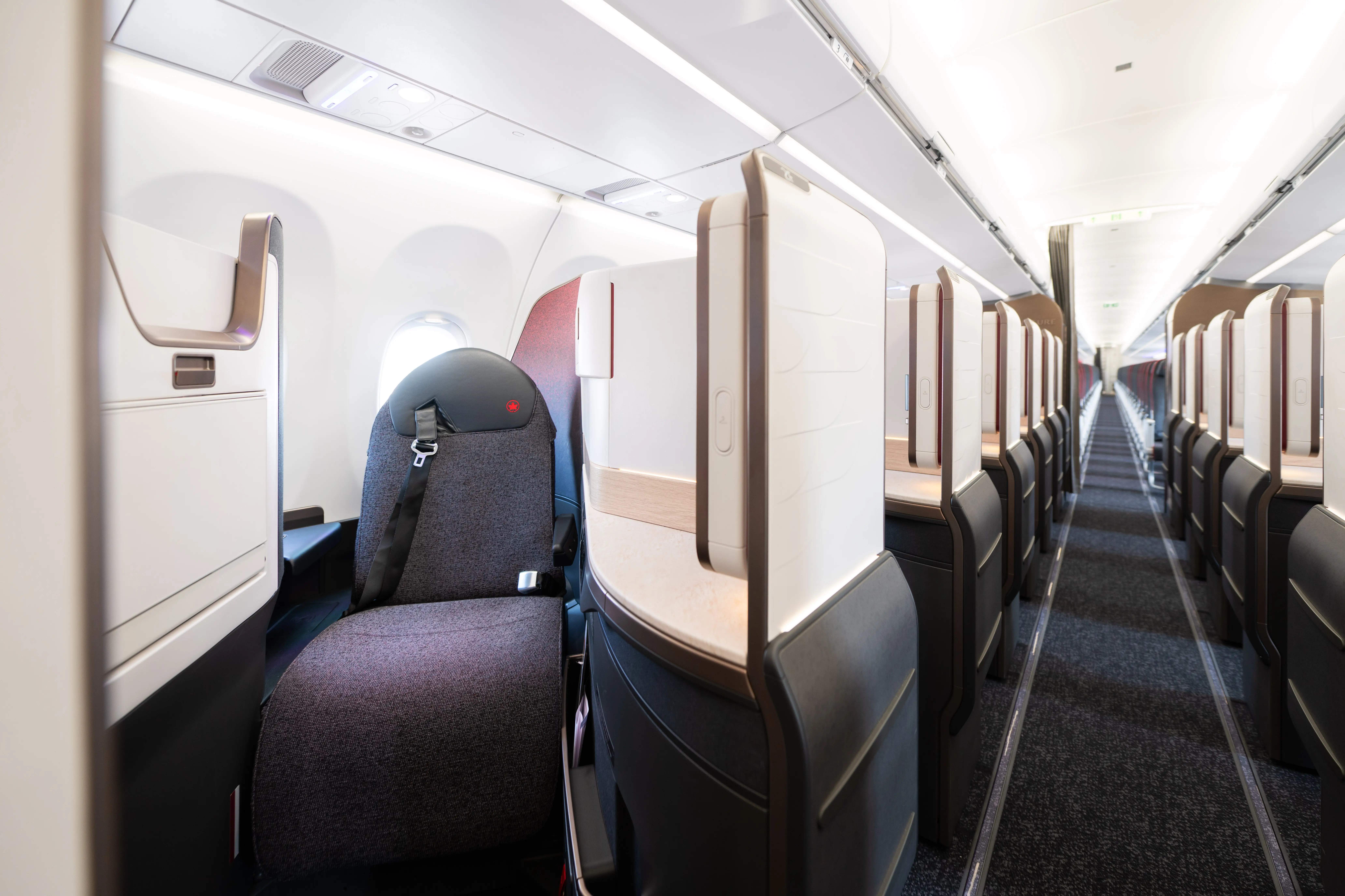 The business class cabin in an Air Canada Airbus A321XLR