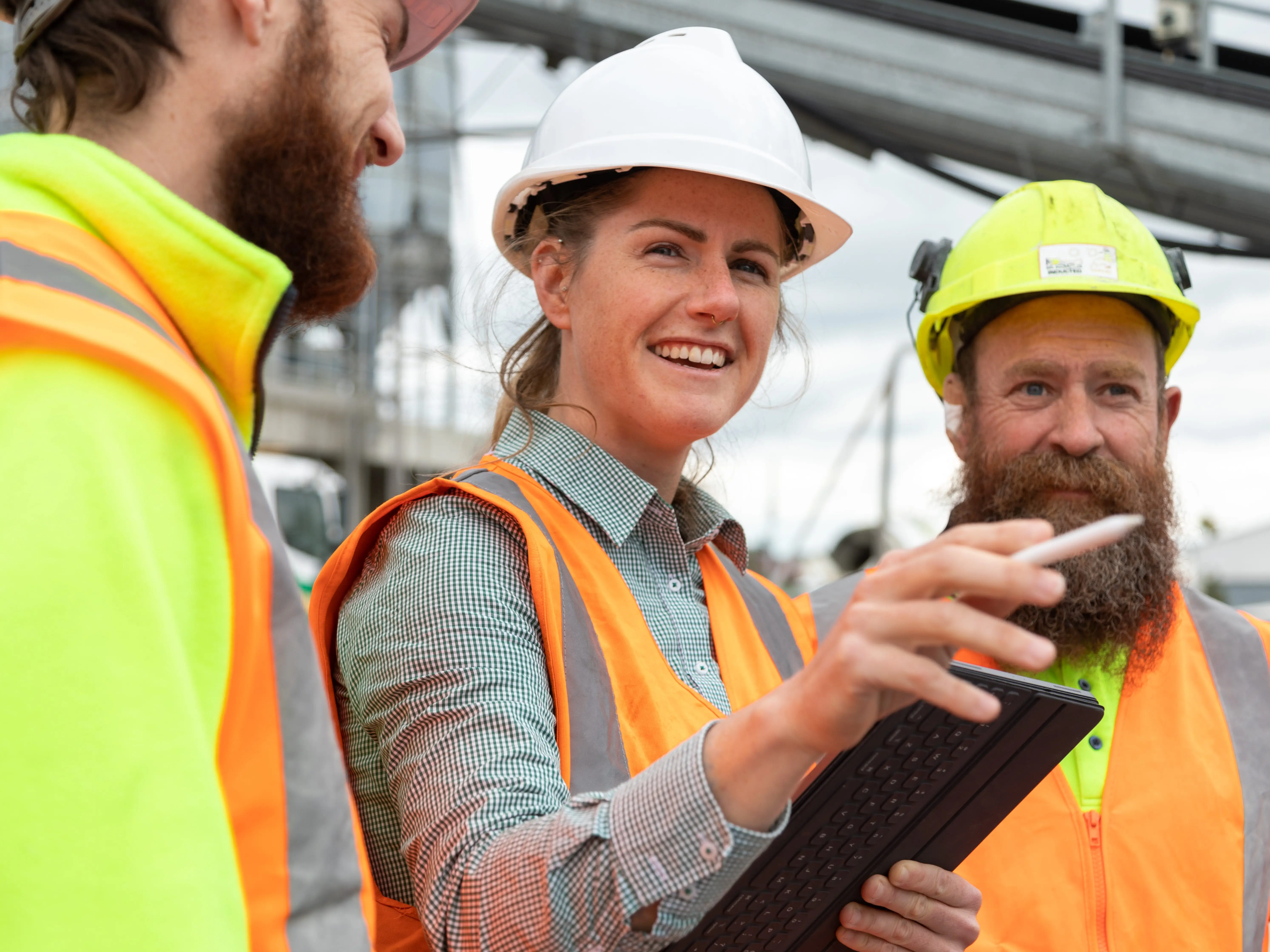 People wearing hard hats and high-visibility vests