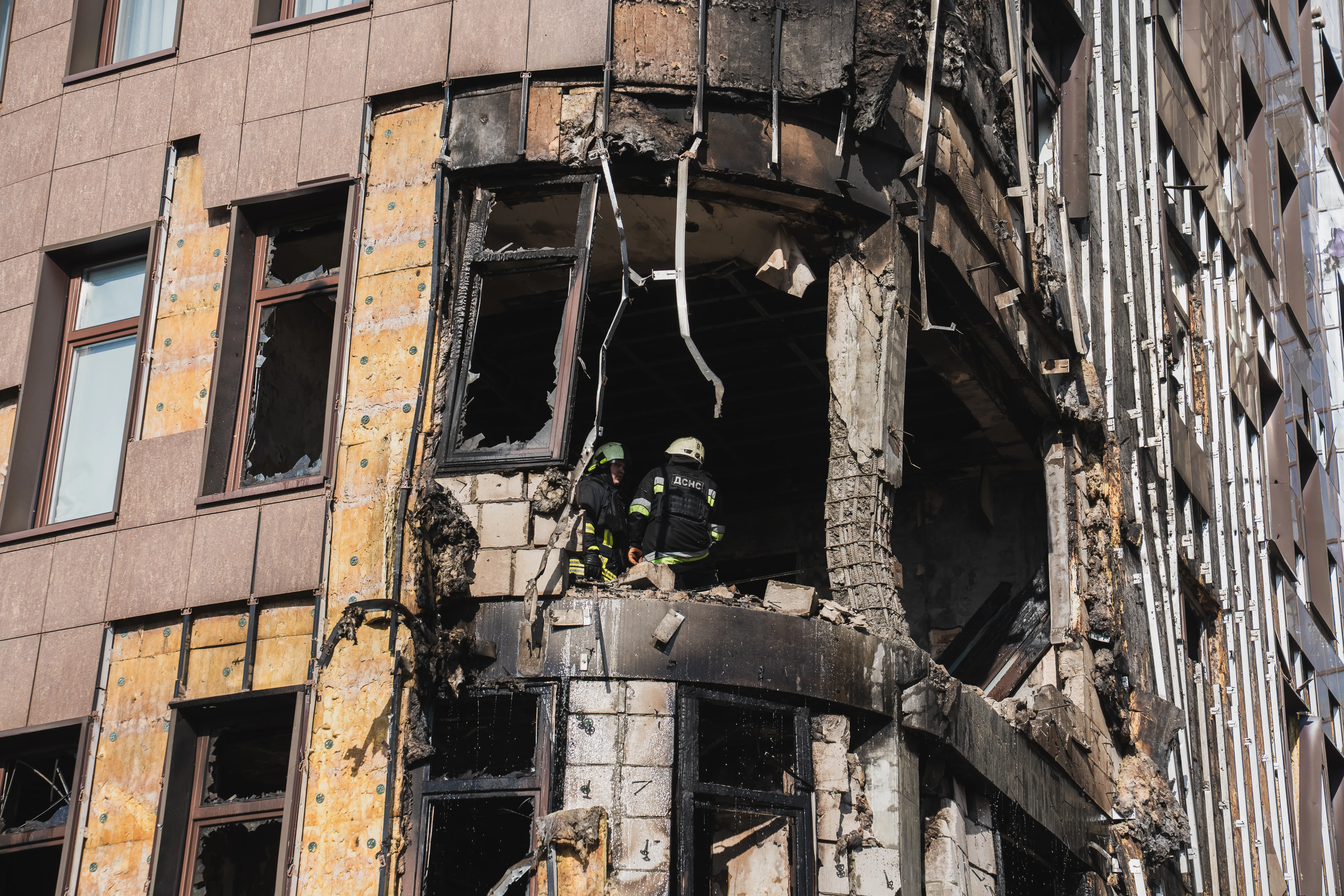 Firefighters work in a building hit by a Geran-3 in April.