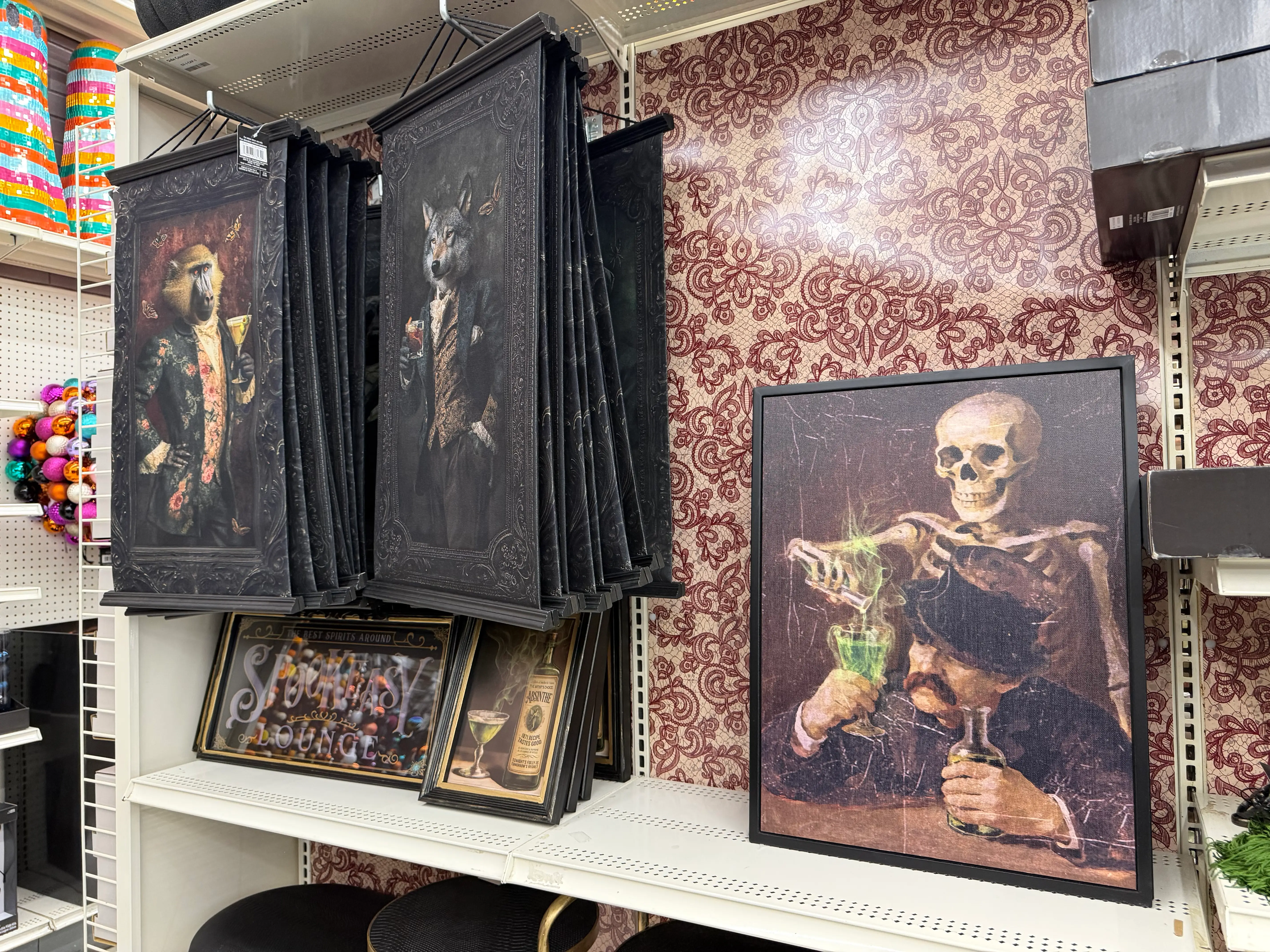 Paintings of animals with cocktails, skeletons, potions, at Michaels
