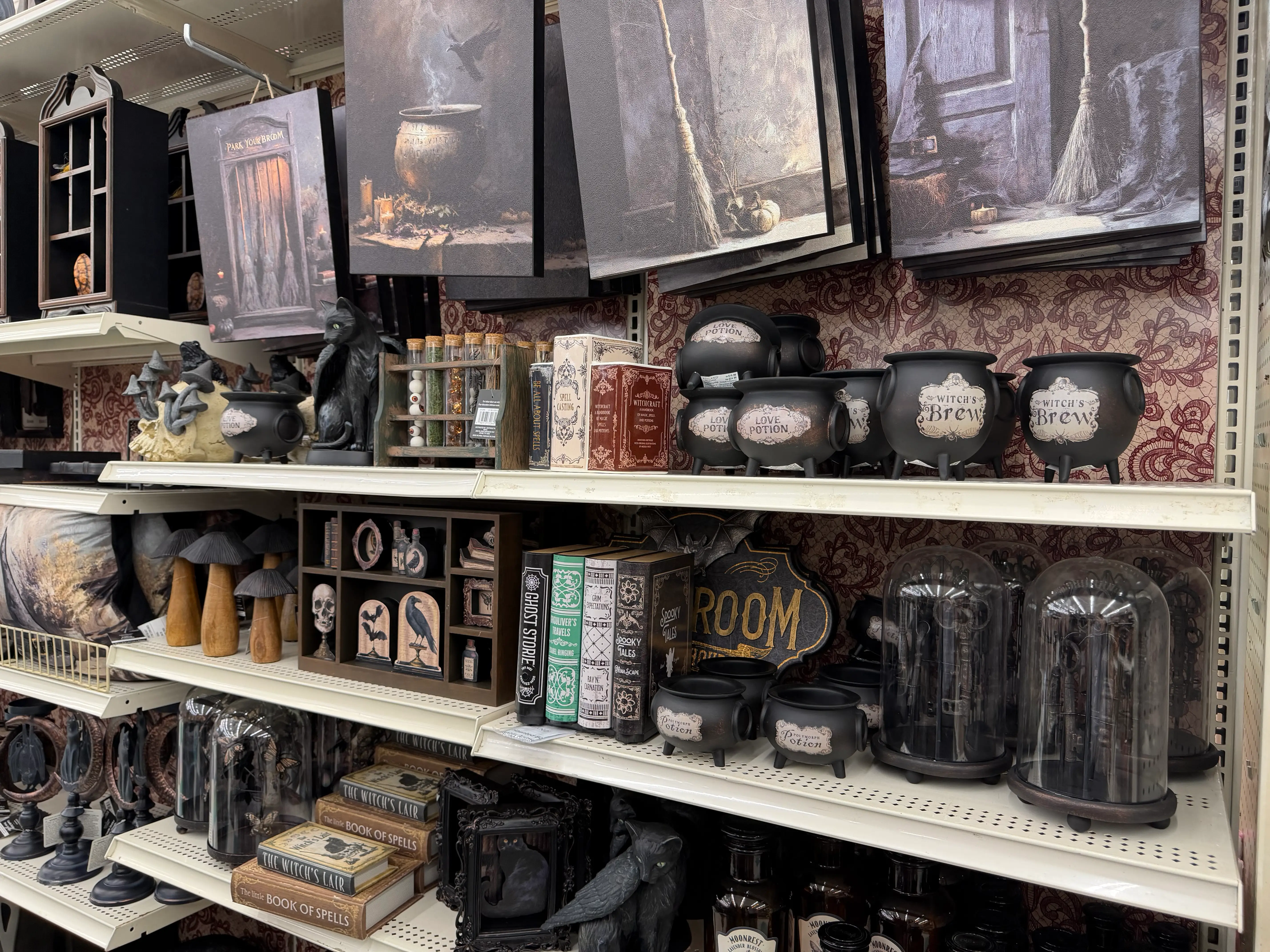 Cauldrons, crows, potions, and other witchy decor in Michaels aisle